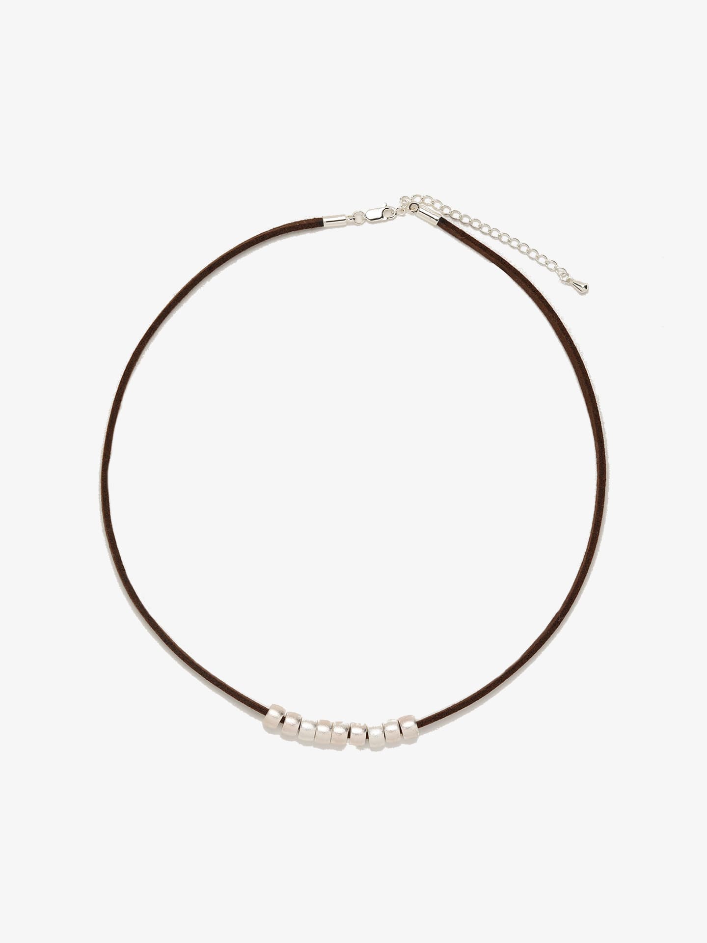 Fairyokai Balance Glide necklace with brown leather cord and textured silver bead on white background.