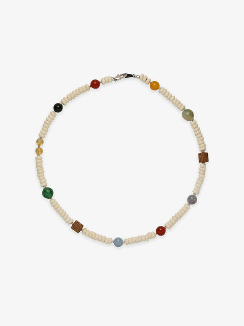 Fairyokai Color Rhythm multicolor stone roller bead necklace on white background.