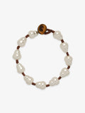 One Fairyokai Full Embrace gourd faux pearl bracelet on a clean white background, showing the round faux pearl beads and brown cord accents.