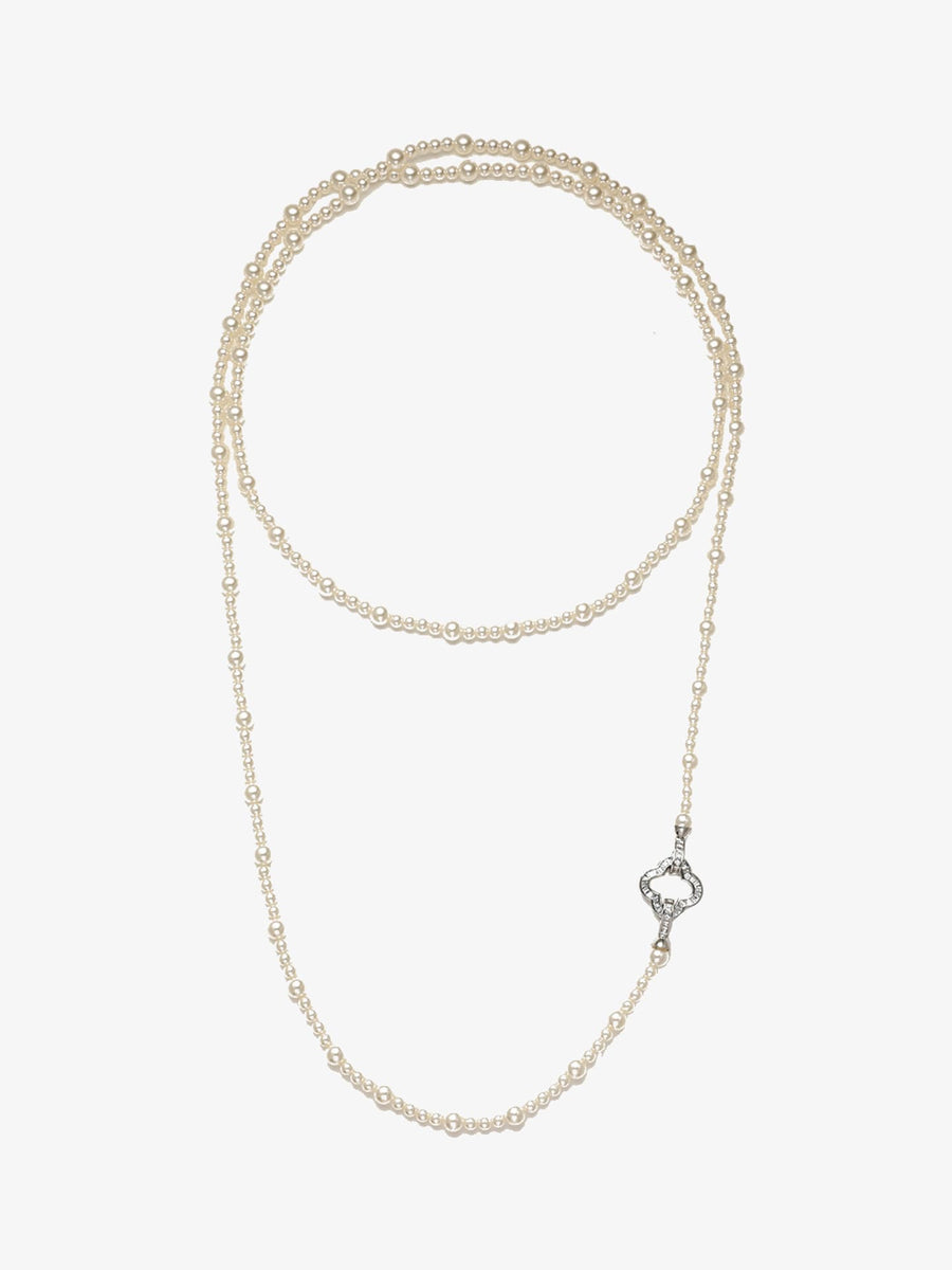 Fairyokai Layered Abundance alternating faux pearl necklace on white background.
