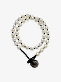 One Fairyokai Lunar Chord double-layer faux pearl bracelet on a clean white background, with two strands of faux pearls and a black cord closure.
