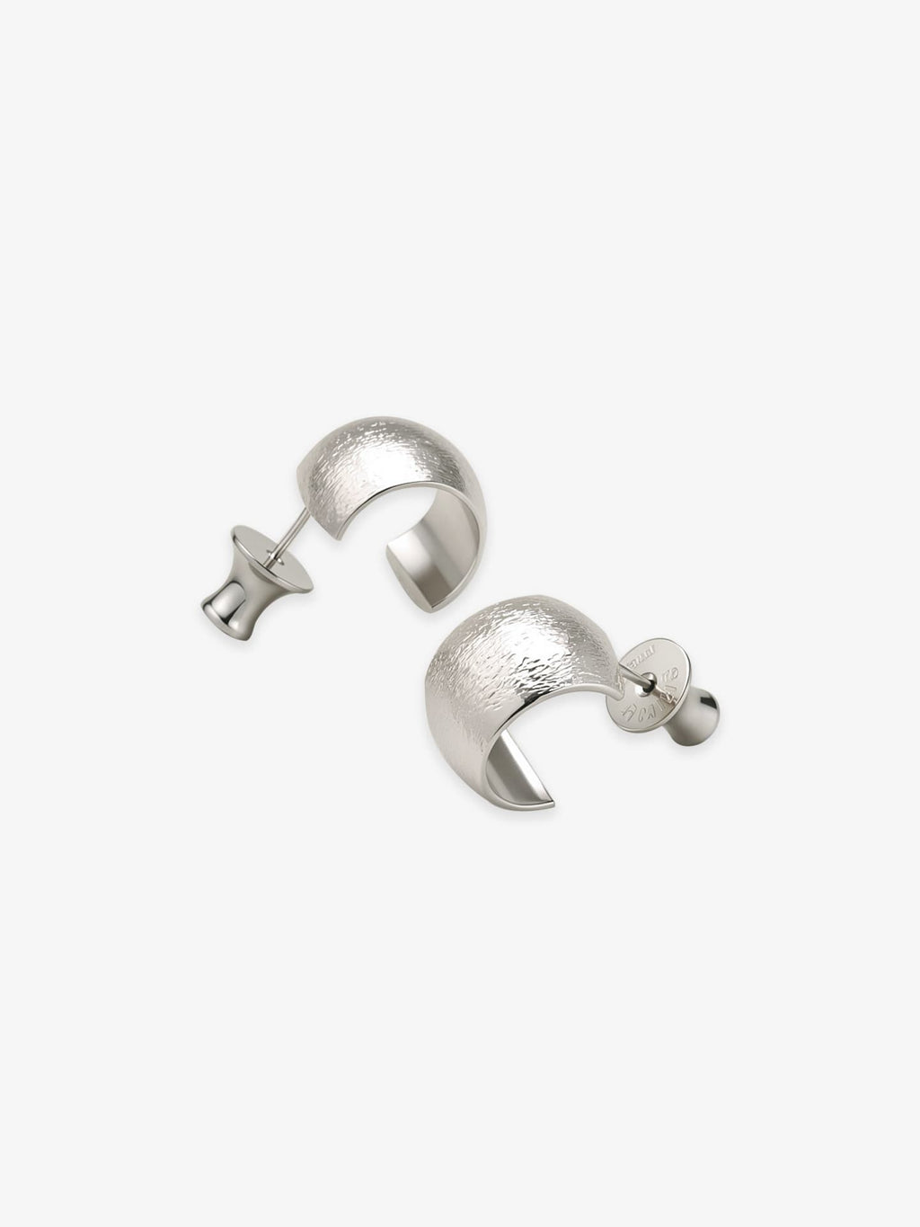 Pair of Fairyokai Moon Trace sand-textured C-shape hoop earrings with S925 silver posts on white background.
