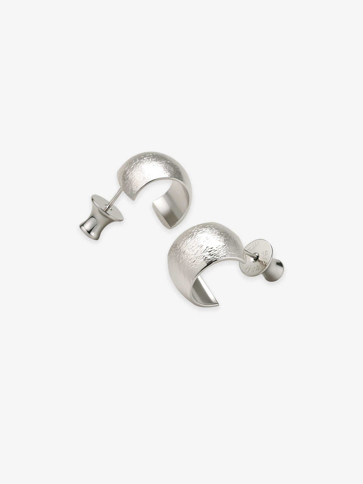 Pair of Fairyokai Moon Trace sand-textured C-shape hoop earrings with S925 silver posts on white background.