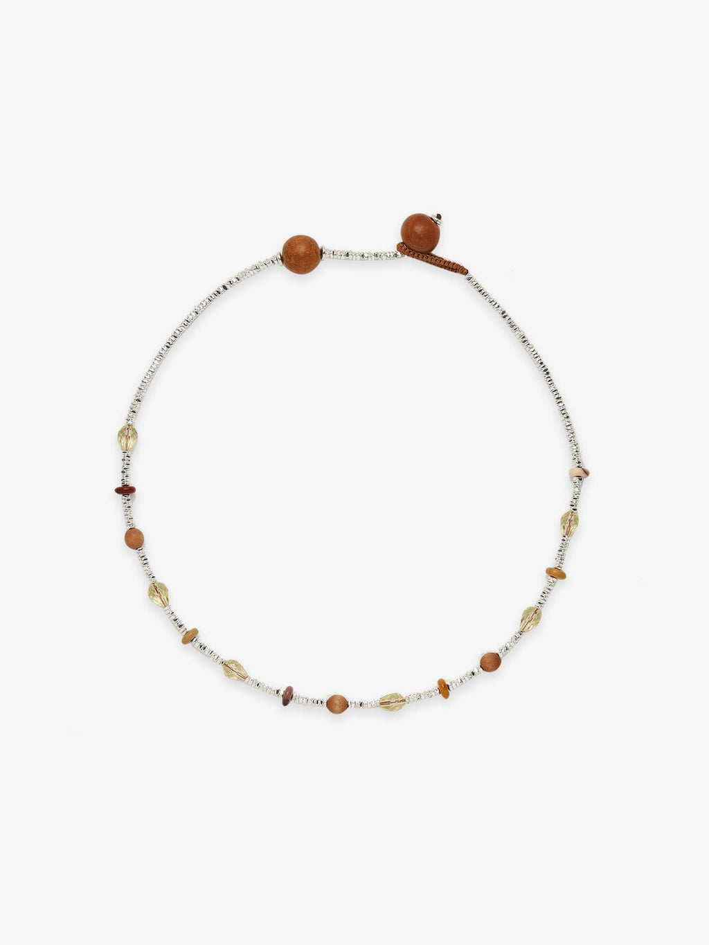 One Fairyokai Soft Pure Light mixed stone braided bracelet on a clean white background, showing pale stones, small warm-toned beads, and adjustable cord ends.