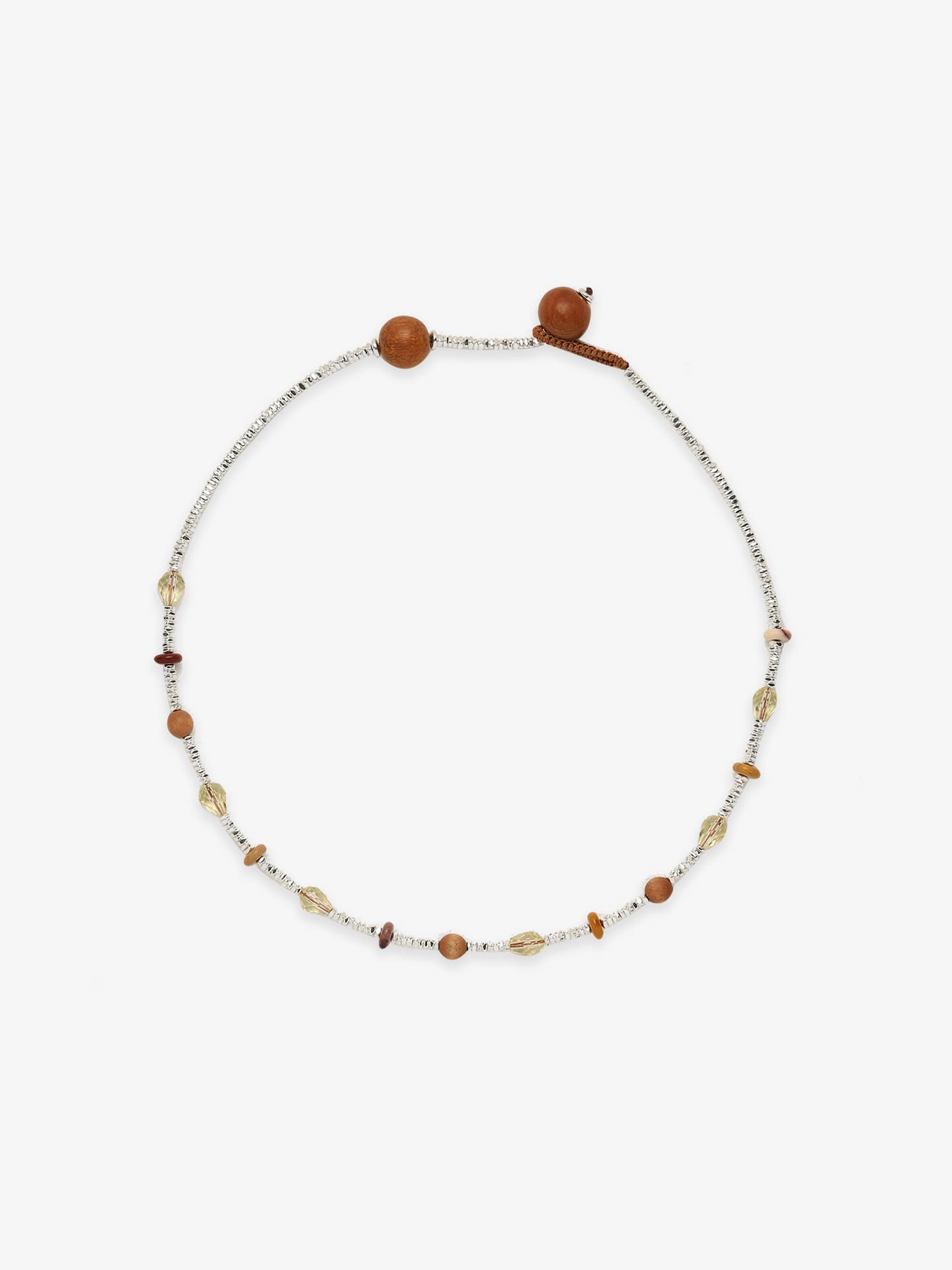 One Fairyokai Soft Pure Light mixed stone braided bracelet on a clean white background, showing pale stones, small warm-toned beads, and adjustable cord ends.