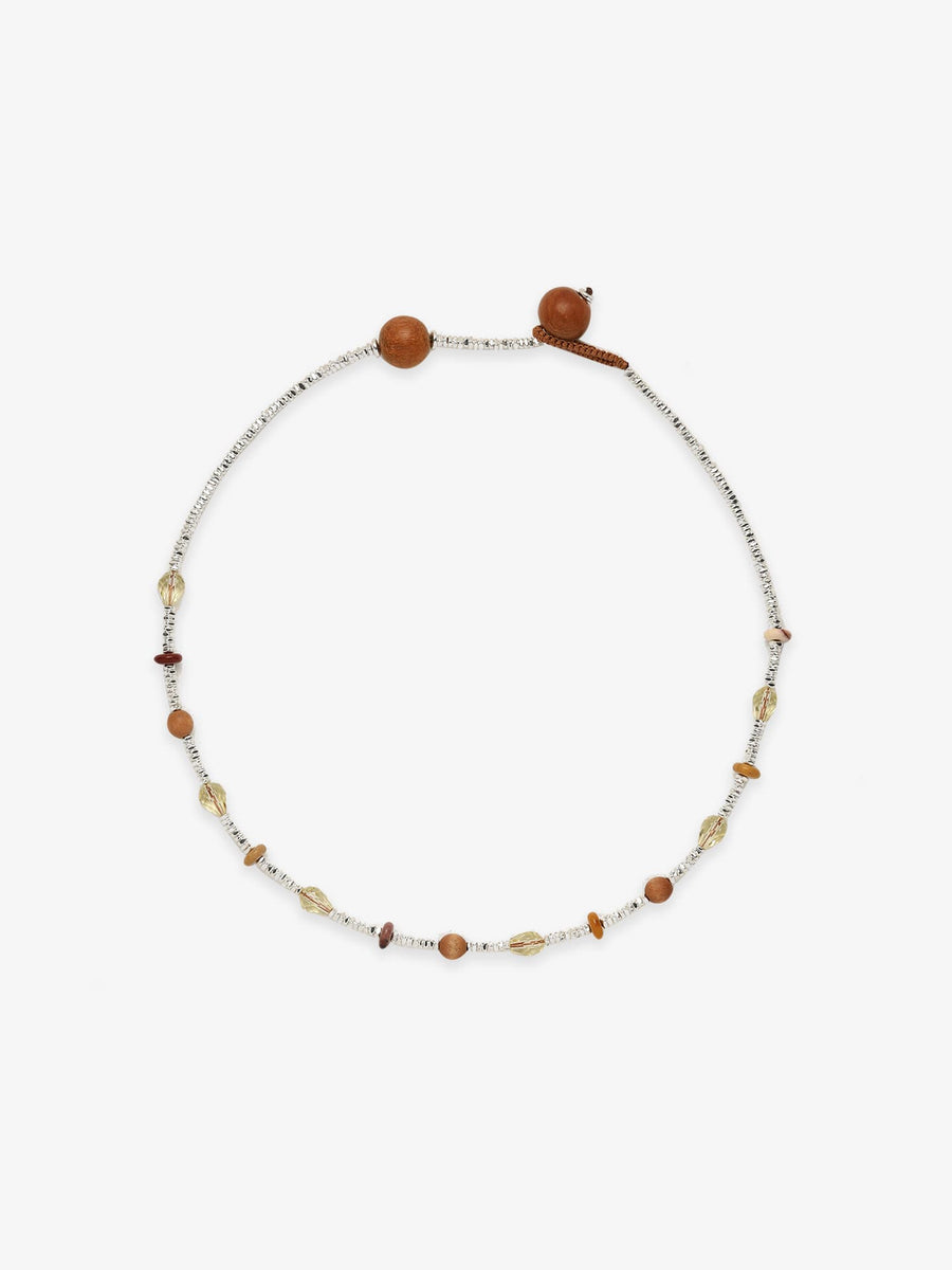 One Fairyokai Soft Pure Light mixed stone braided bracelet on a clean white background, showing pale stones, small warm-toned beads, and adjustable cord ends.