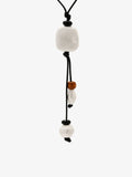Fairyokai Suspended Stone waxed cord and wood necklace on white background.