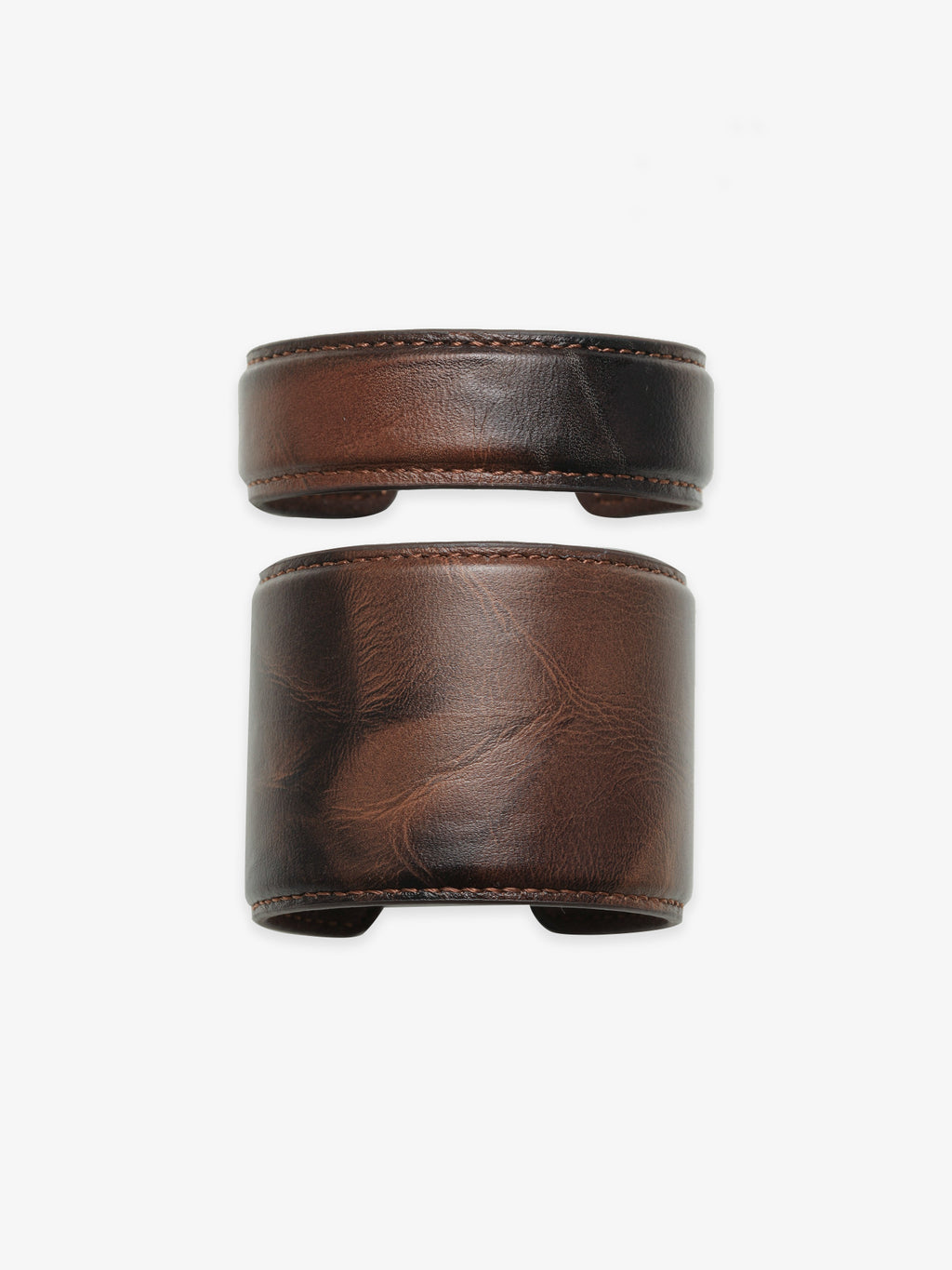 Two Fairyokai Vein Cuff PU leather bracelets on a clean white background, shown as a stacked set with dark brown leather texture.