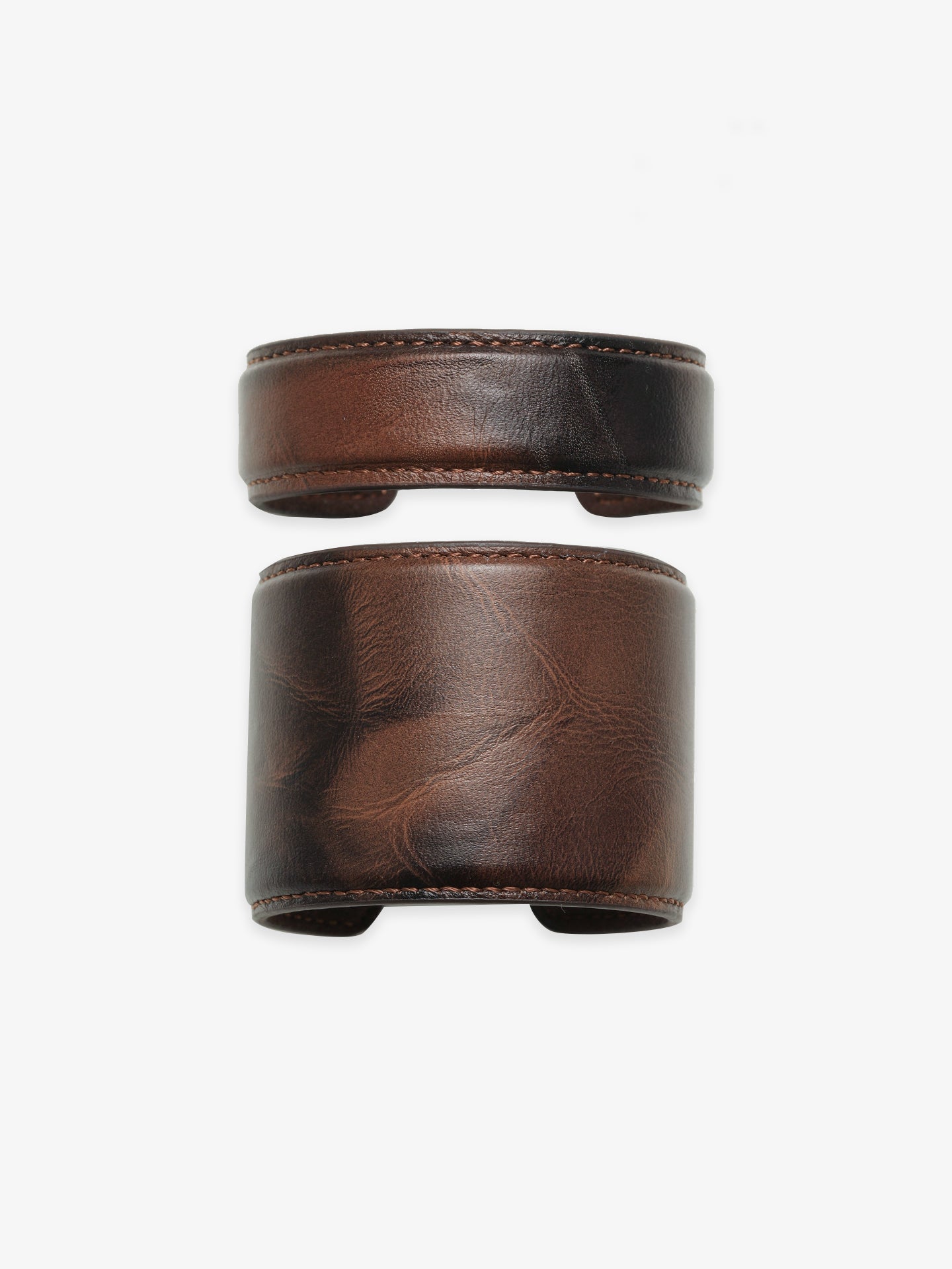 Two Fairyokai Vein Cuff PU leather bracelets on a clean white background, shown as a stacked set with dark brown leather texture.