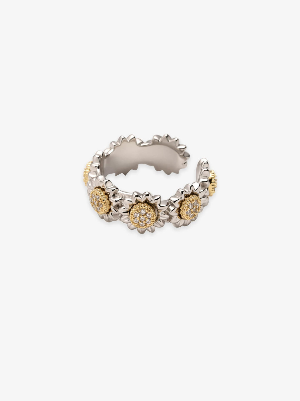 One Fairyokai Wild Daisy gold textured zircon ring on a clean white background, with clustered daisy shapes and clear zircon accents.